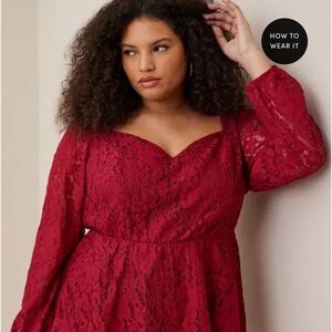 Torrid puff sleeve lace peplum top.